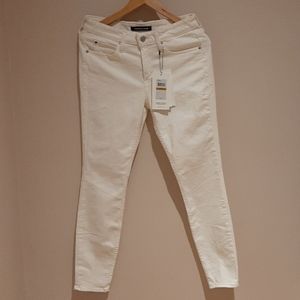 Calvin Klein White Mid Rise Skinny Jean's
